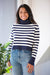 DELUC Pugliese Striped Turtleneck Sweater